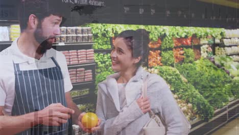 animation of financial graphs over happy caucasian male seller and female customer in grocery shop