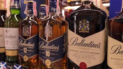 ballantine's scotch whisky bottles on display