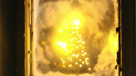 christmas tree through a frosted window