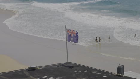 people enjoying the waves and beach