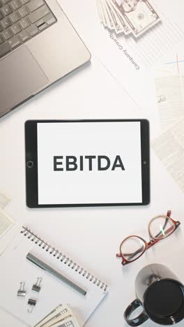 vertical video of ebitda displaying on a tablet screen