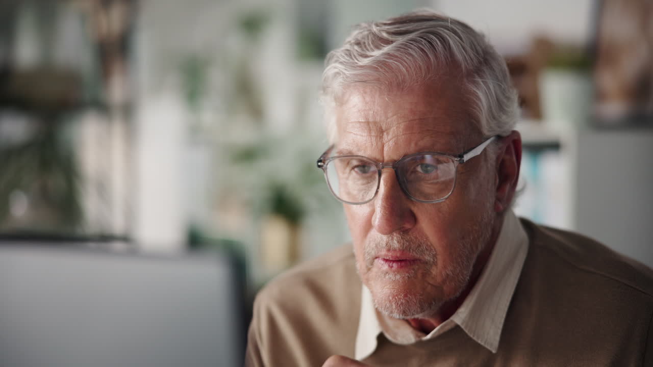 Senior man working on computer