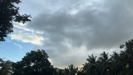 grey rain clouds moving fast. time lapse
