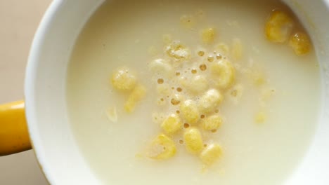 creamy corn soup in a bowl