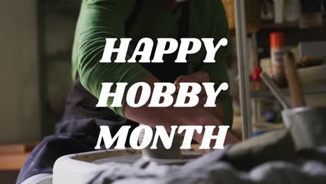 animation of happy hobby month text over midsection of caucasian man forming pottery