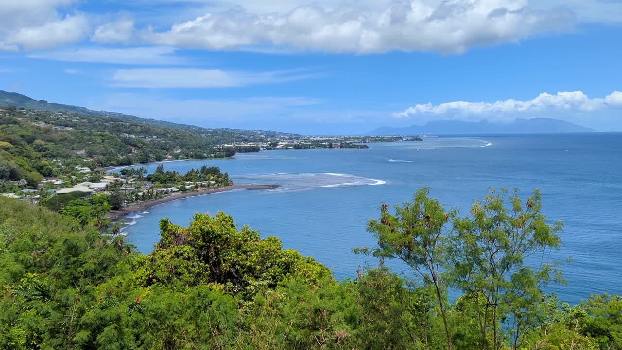 Scenic view of Papeete coastline, ocean and coral reefs from Belvédère du Tahara'a viewpoint in Tahiti, French Polynesia