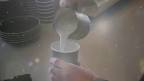 animación de puntos de luz sobre el hombre haciendo café trabajando en la cafetería