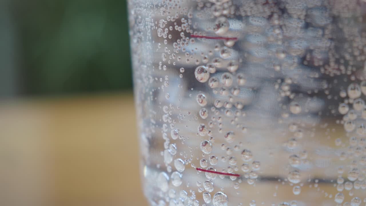 Close up of a glass of carbonated water
