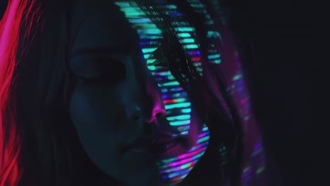 colorful led projections illuminating woman's face with artistic, futuristic glow, creating dynamic visual effect against dark studio background