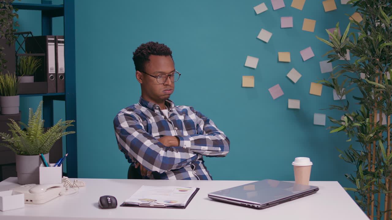 Furious worker feeling tense about work mistake on laptop