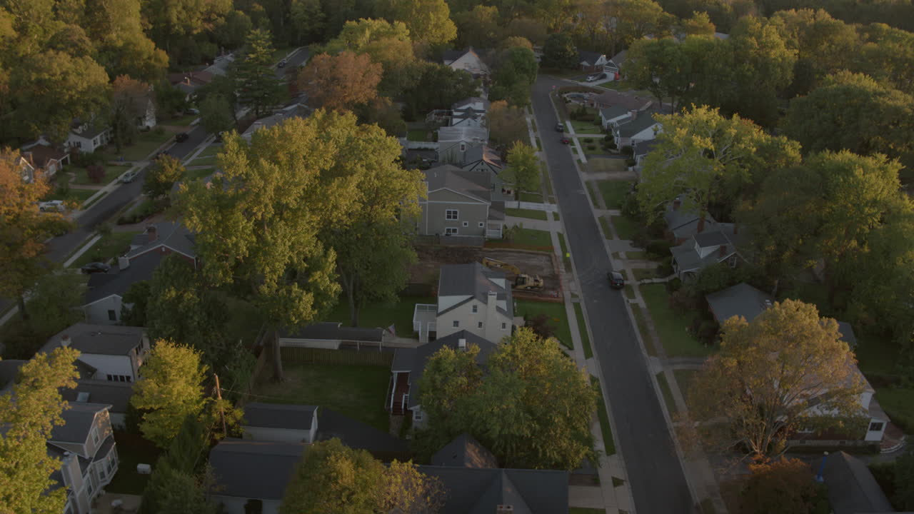 Pretty suburban street in the midwest tilt down to overhead view