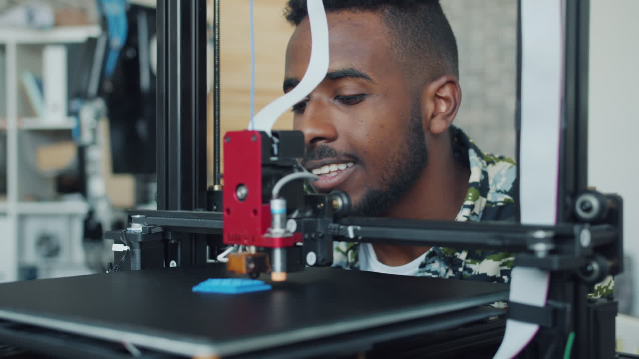 Man using 3D Printer