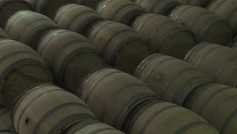 barrels of beer in a warehouse