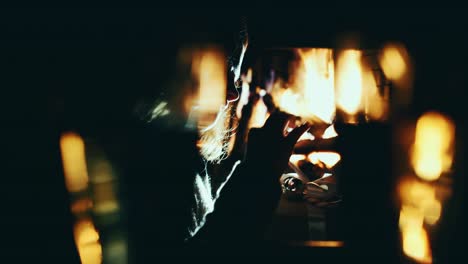 couple in front of fireplace