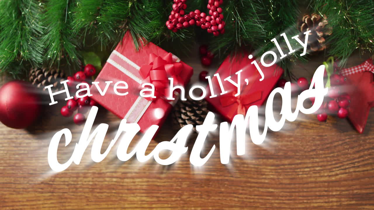 크리스마스 장식 위에 홀리, 즐거운 크리스마스 텍스트를 가지고 있는 애니메이션