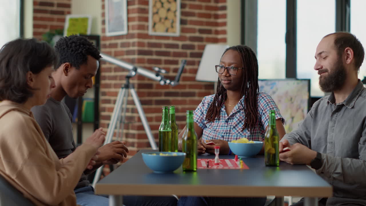Multiethnic group of people meeting to have fun with board games