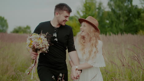 lovely happy young couple embracing outdoors in summer