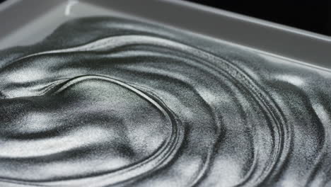 mesmerizing silver metallic fluid texture