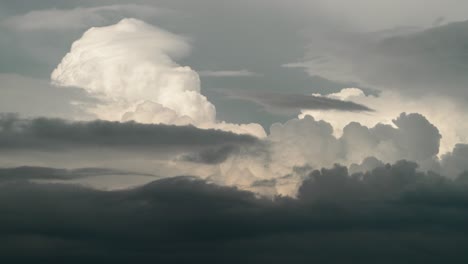 dramatic dark and light gray puffy rainstorm clouds forming