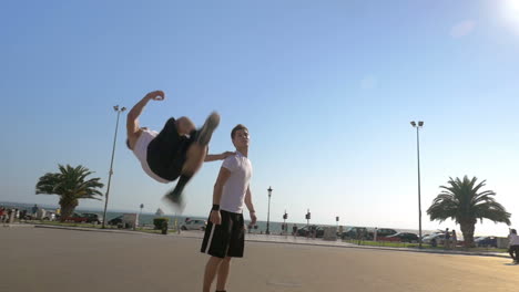 showing acrobatics in the street