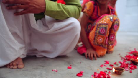 parents with kids celebrate the indian traditional festival of diwali