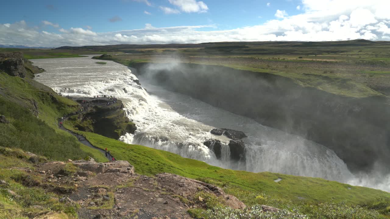 Powerful And Spray-filled Gullfoss Waterfall On A Windy Day In Iceland. Wide Shot