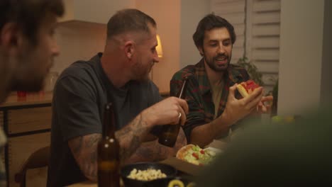 friends enjoying dinner and drinks at home