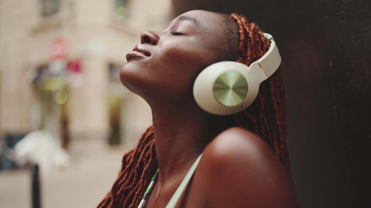 Woman with headphones enjoying music