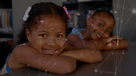 children leaning on the table with light connections