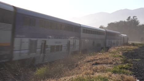 Amtrak-Passenger-Train-Moves-Along-The-Coast-Of-Santa-Barbara,-California