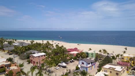 Mexico-Vacation-Spot---Warm-Tropical-Beach-on-Baja-California-Town,-Aerial-Drone