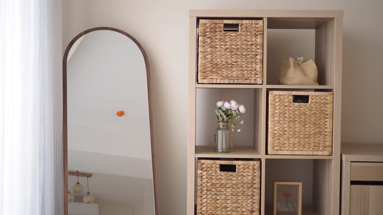 Interior with Mirror, Shelf, and Woven Baskets