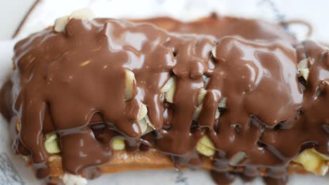 chocolate covered pastry with almonds