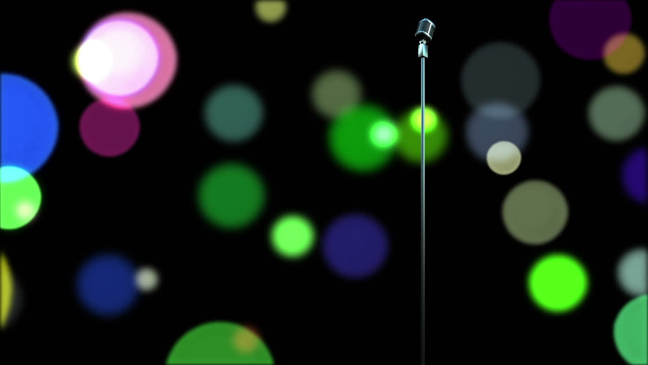 검은 바탕에 빛의 다채로운 반점에 대한 레트로 금속 마이크로폰
