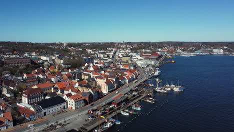aerial view of a coastal town with harbor