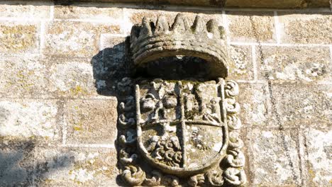 Emblematic-Crest-at-Santa-María-de-Feá-church,-Toén,-Spain