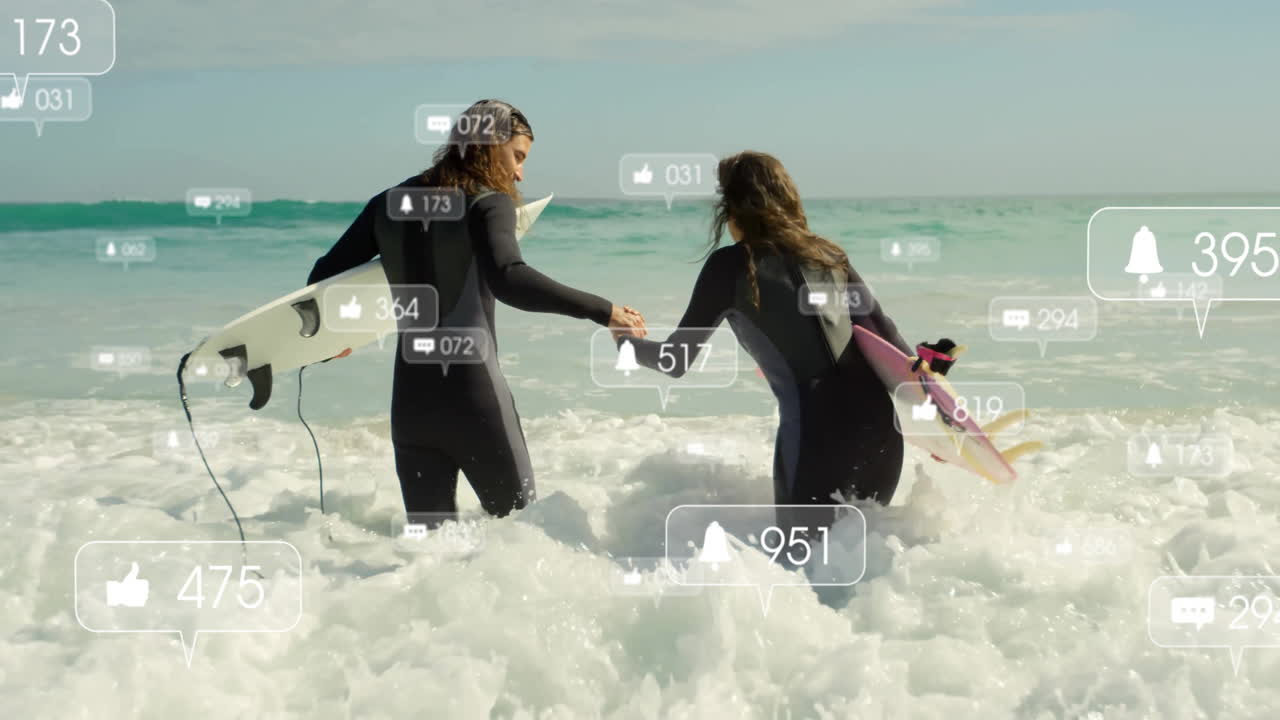 Surfing couple walking hand in hand into foamy ocean waves, displaying social media marketing icons
