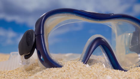 a snorkel mask on the beach