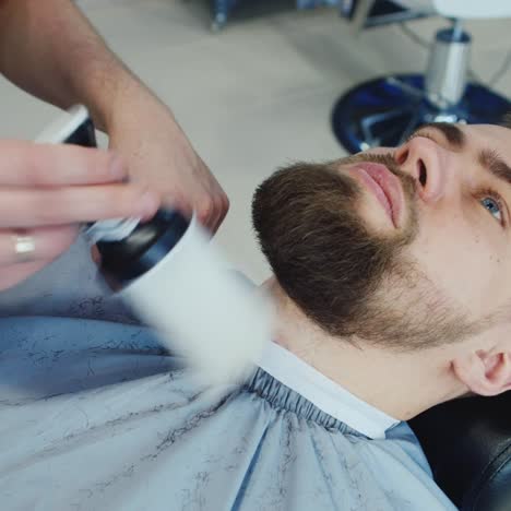 Barber-Shaping-A-Client's-Beard