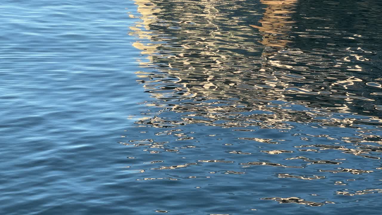 Reflections on water surface in a harbour in Cape Town, South Africa