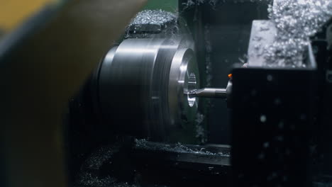 lathe spins and cuts basic metal workpiece