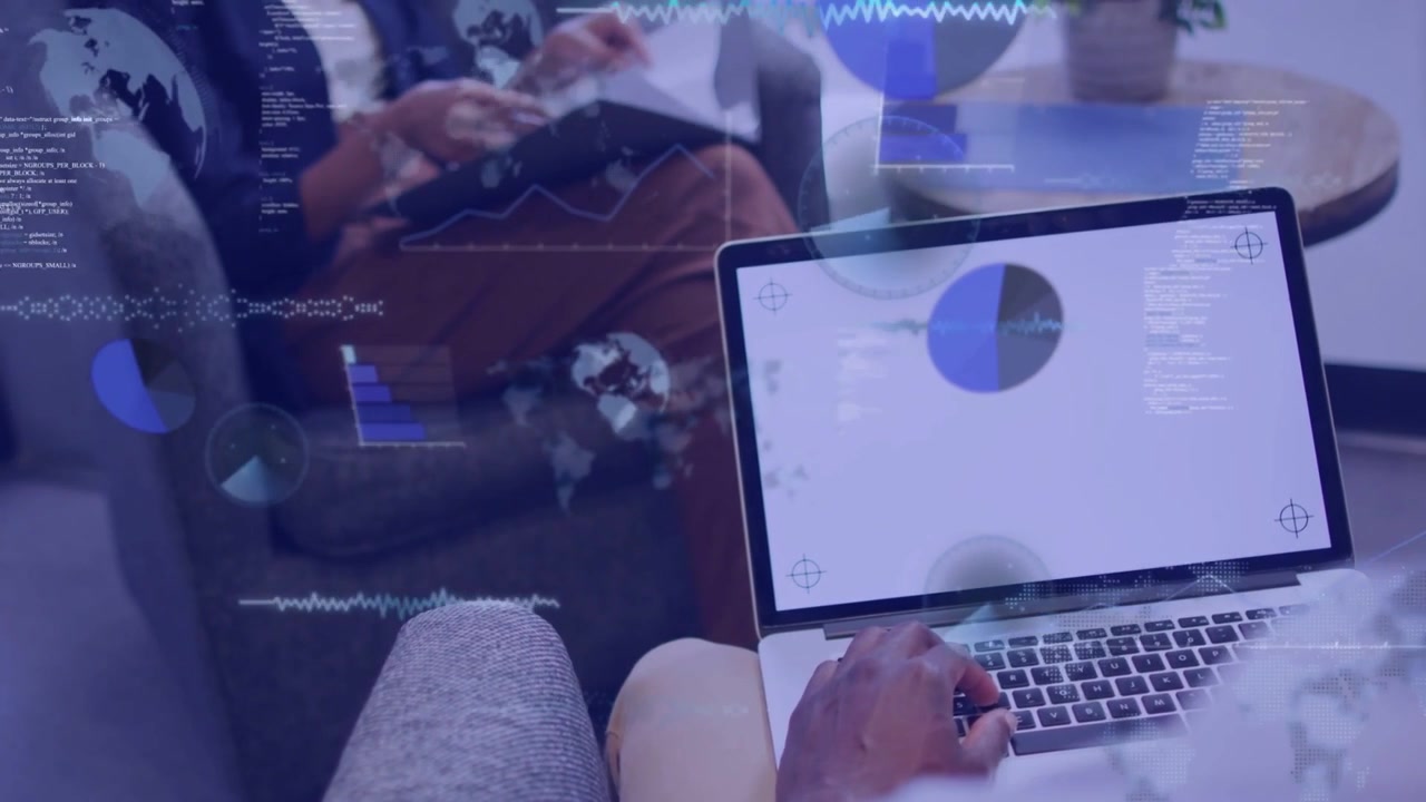 Man using laptop while peer flipping docs sparking rising pie bar globe charts for business insight