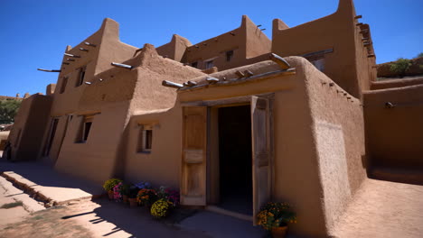 adobe building with flowers