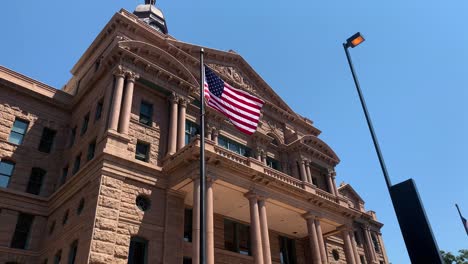 Close-up-of-Fort-Worth-Tarrant-County-Historic-Courthouse-building-in-4k-establishing-exterior-shot