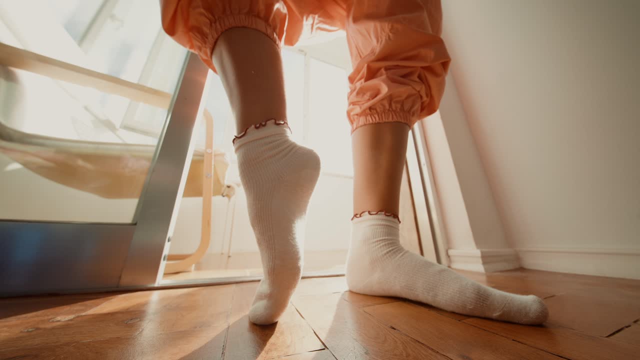 A child's legs and feet