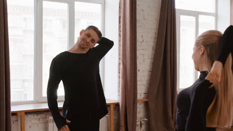dancers practicing in a bright studio