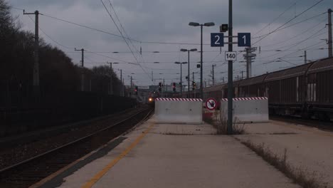 train driving through the station