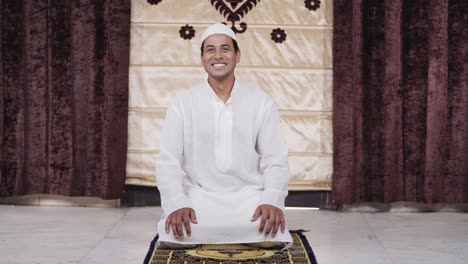 indian muslim man smiling to the camera