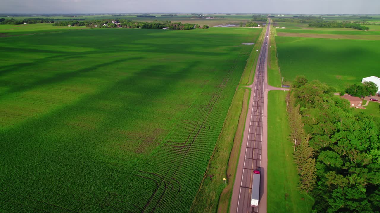 Aerial view of Semi trucks on country road in wisconsin, USA