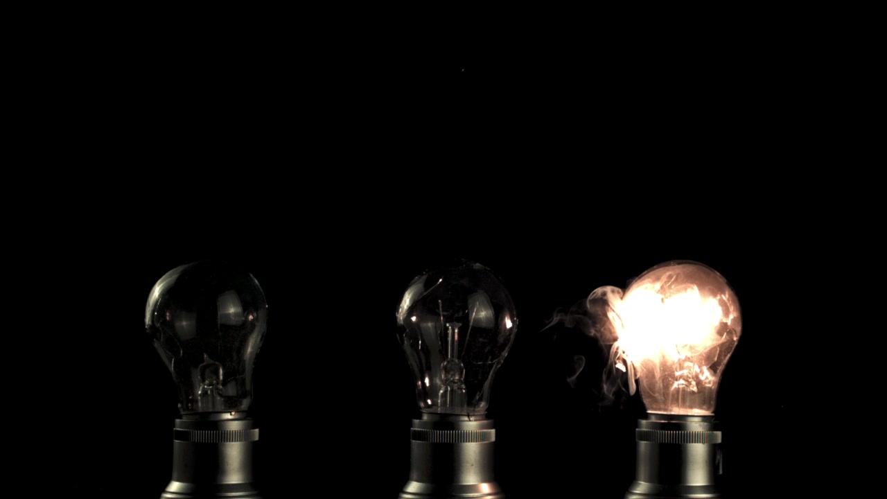 Slow Motion of Light Bulbs Shattering and One Smoking